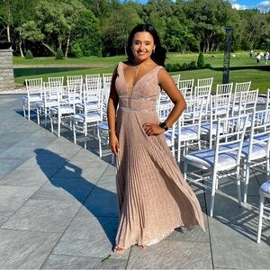 Selling beautiful dress for any occasion, one time use.